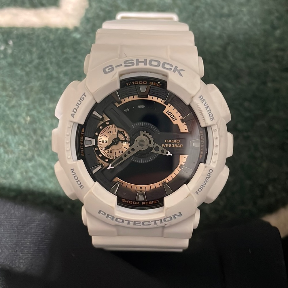 White and Black Casio G-Shock watch